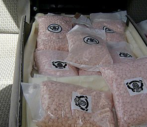 الحكم بسجن مدان باستيراد مادة مخدرة بقصد الاتجار 10 سنوات