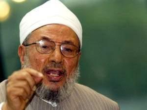 القرضاوي: من يموت بانفلونزا الخنازير ليس 'شهيداً' وتعطيل الحج بسببها غير مقبول شرعا