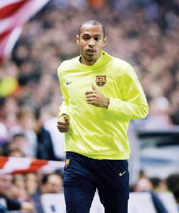 زيدان ونيفيل يدافعان عن هنري المتهم بالغش