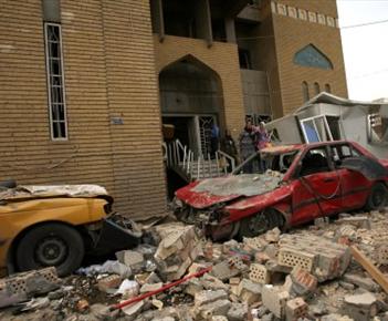 مقتل 28 شخصا بتفجير مبان سكنية في بغداد