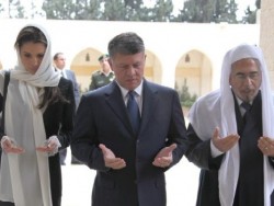 الملك والملكة يزوران ضريح الحسين