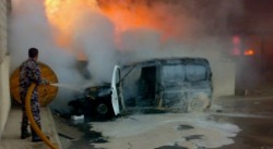 مجهولون يحرقون سيارة لمحكمة بداية معان واعتصام للموظفين