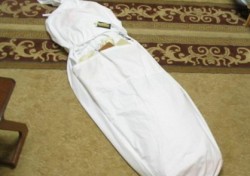 جثة متفحمة لفتى تعرض للتعذيب في حي نزال