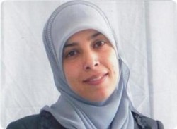 القنصل الأردني قابل الأسيرة التميمي مكبلة