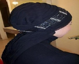 دائرة الإفتاء تحرم رفع شعر الرأس للمرأة المحجبة