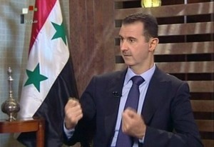 الاسد حذر الغرب من التدخل في سورية وينذر بـ"زلزال" يحرق المنطقة