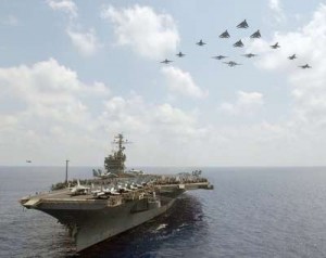 حشود وتحركات عسكرية وحاملات طائرات أميركية وكندية في المنطقة تحاصر سوريا وايران تقابلها بوارج حربية روسية