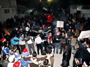 السوريون يستقبلون العام الجديد تحت شعار "سنة سودا يا بشار"