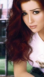 مي عز الدين : أجيد الرقص ويسرا ضربتني ! (صور)