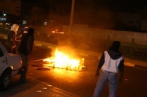 اشتباكات في الكرك .. وإصابة مصور صحفي .. وحرق منزل المتصرف في المزار الجنوبي