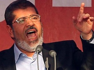 مرسي يضحك من وصفه ب "الفرعون"