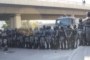 منع متقاعدي بنك الاسكان من نصب خيمة اعتصام