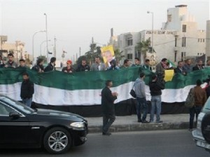 اشتباكات بين الأمن ومتظاهرين معارضين للأسد أمام السفارة السورية