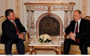 الملك وبوتين يستغنيان عن المترجم خلف باب مغلق