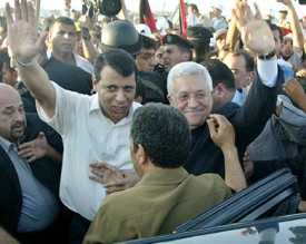 مصالحة بين عباس ودحلان برعاية ملكية اردنية