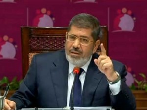 مرسي في القمة العربية: من المحرمات أن يضع أحد اصبعه داخل مصر!