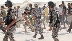 لاجئون سوريون يصيبون 5 رجال أمن