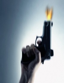 شرطي يطلق النار على نفسه