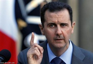 الأسد يمنع التعامل بغير الليرة السورية