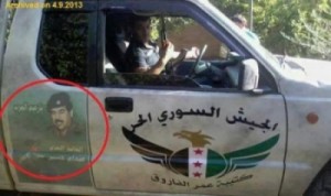 صدام حسين على آليات "الجيش الحر".. صورة