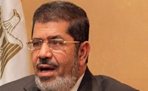 نجل مرسي يؤكد رفض والده الخضوع للمحاكمة