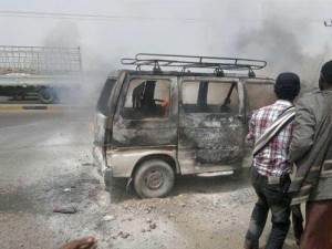 إحراق سيارة باص في الكرك