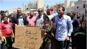 دعوات لإسقاط الحكومة في مسيرة الحسيني