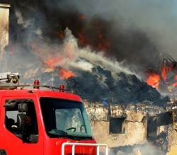 وفاة عامل بحريق مصنع للكرتون بلواء الجيزة في مادبا