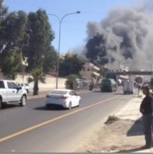 بالفيديو والصور ... دخان كثيف يغطي دوار صويلح ويتسبب بأزمة سير خانقة !