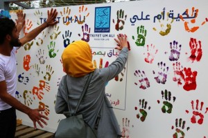 طلبة جامعة عمان الأهلية يشاركون بفعالية "بصمة إيد" التي تنظمها  تكية أم علي