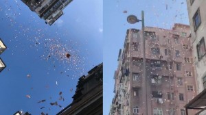 بالصور .. السماء تمطر مالاً في هونغ كونغ .. والامن يلقي القبض على المتسبب