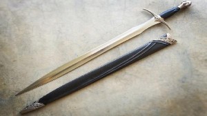 ضبط (سيف) على شكل "عكاز" بمركبة عشريني في الزرقاء