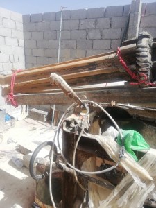 بالصور ... ضبط حفارة كهربائية مخالفة وردم بئر وتوقيف مالك المزرعة في معان