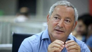 سميح ساويرس يعلق استثماراته بمصر